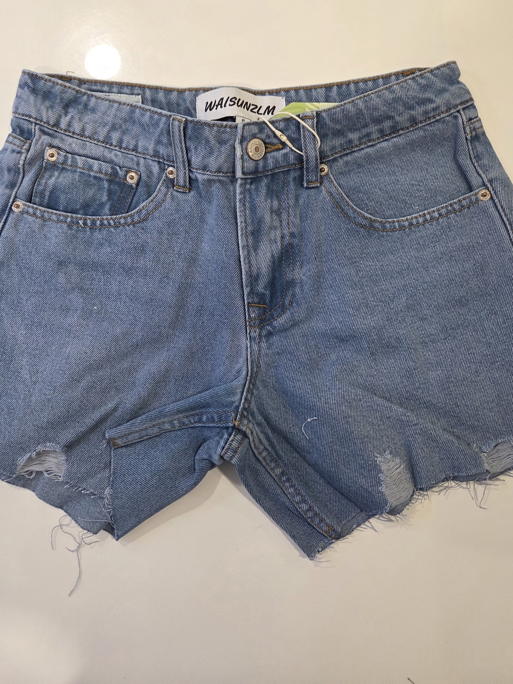 Women's Light Blue Distressed Denim Cutoff Shorts